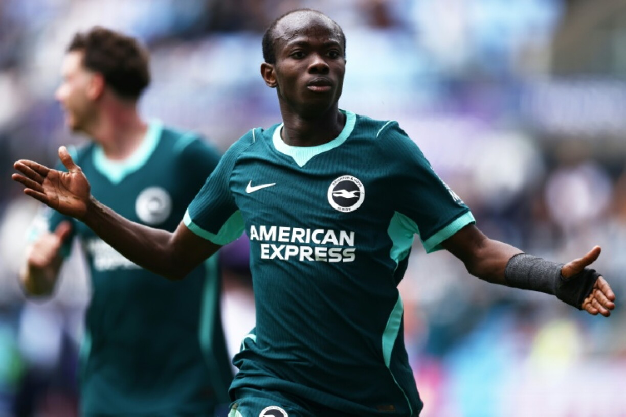 Malick Yalcouye celebrates scoring for Brighton against Coventry in the Premier League this season.