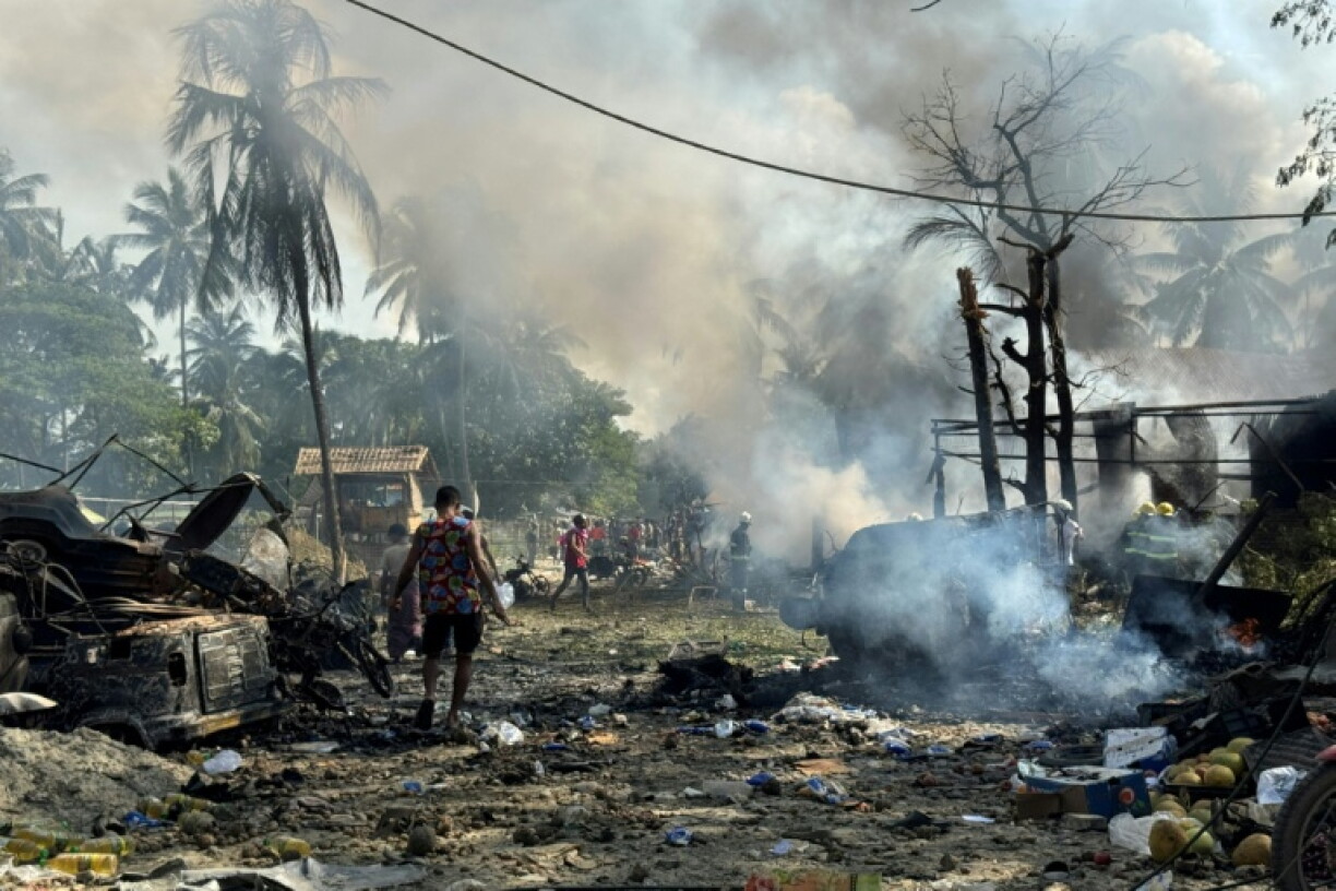 The aftermath of the airstrike on a market in Rakhine state on Monday. Local aid workjers say the death toll has risen to 50