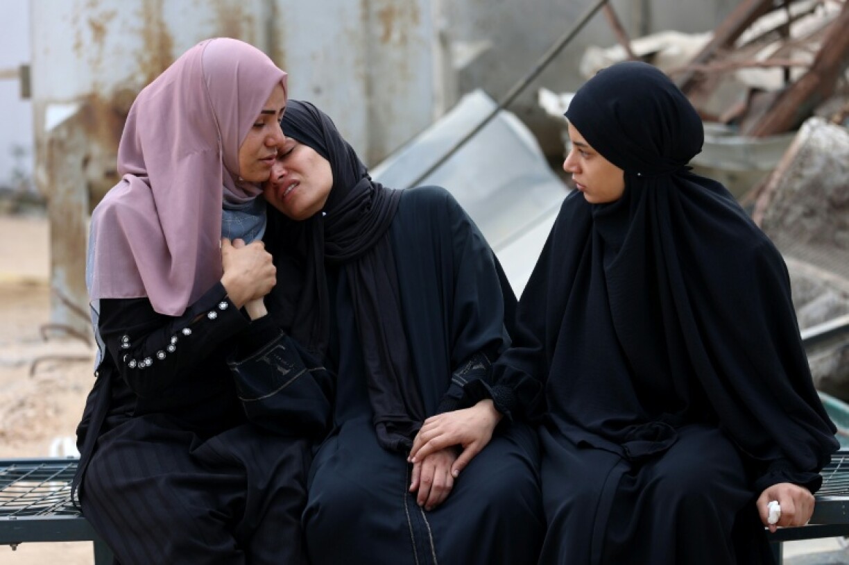 Mourners at a funeral of a Palestinian killed near an aid distribution centre in the Gaza Strip