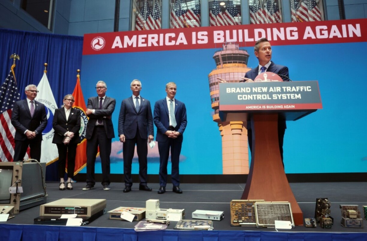 U.S. Secretary of Transportation Sean Duffy (R) speaks alongside airline executives, including (2ndR-L) CEO of United Airlines Scott Kirby, Robert Isom CEO of American Airlines, Ed Bastian CEO of Delta Air Lines, Joanna Geraghty CEO of JetBlue and Robert Jordan CEO of Southwest Airlines, at an event unveiling a new U.S. air traffic control system