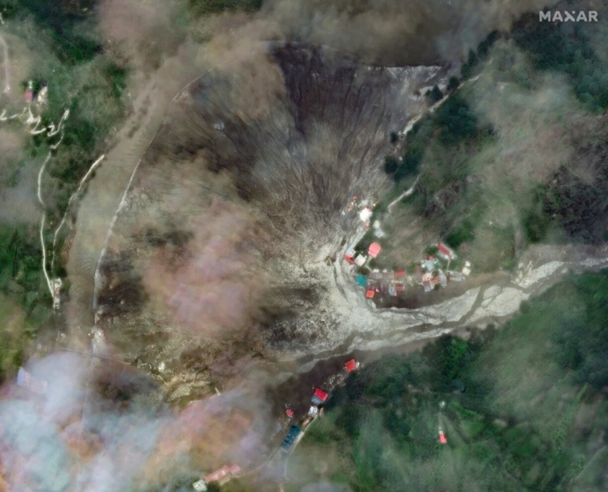 This satellite image from Maxar Technologies shows the destruction from the flood and landslides in Dharali