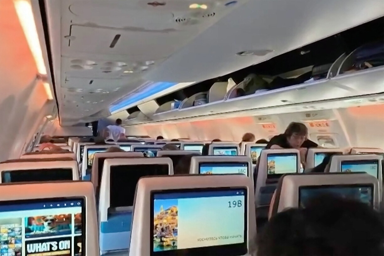 This screengrab taken from a handout video footage via AFPTV on September 30, 2026 shows passengers inside the rerouted flydubai flight FZ 1073, ahead of its departure to Tel Aviv from Saudi Arabia’s Tabuk airport. Israeli President Isaac Herzog said on October 1 he would present "heroism" awards to four Israelis who helped overpower a flydubai co-pilot and prevented him from crashing the plane they were on. He also hailed the plane's Indian pilot, Smit Machchha, who Israeli officials say managed to open the cockpit door to let passengers and crew save the plane after being stabbed by the co-pilot.