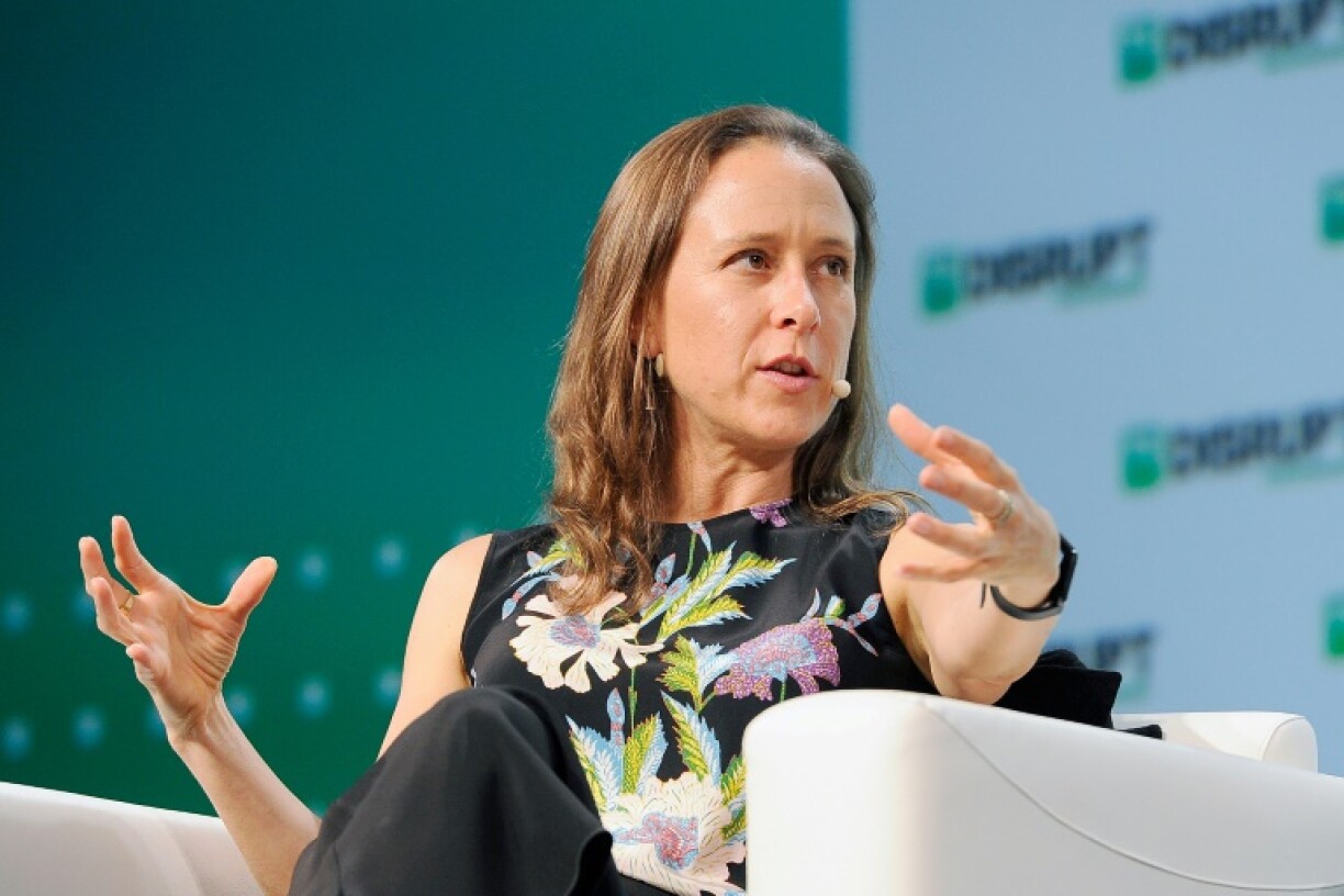 Anne Wojcicki stepped down as chief executive of 23andMe to pursue a purchase of the genetic testing firm, which filed for reorganization in bankruptcy court in the United States