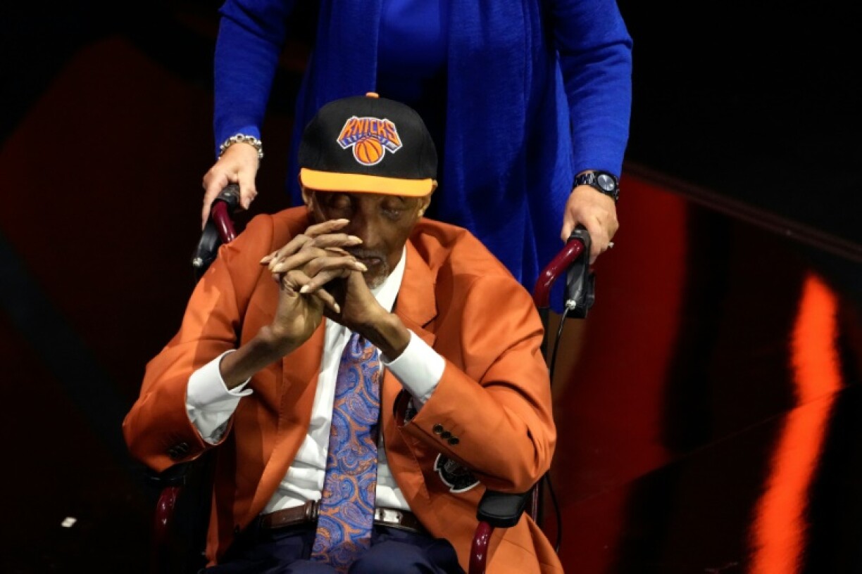 Former New York Knicks star Dick Barnett, shown on stage during his 2024 Basketball Hall of Fame induction ceremony, has died at age 88, the NBA club announced