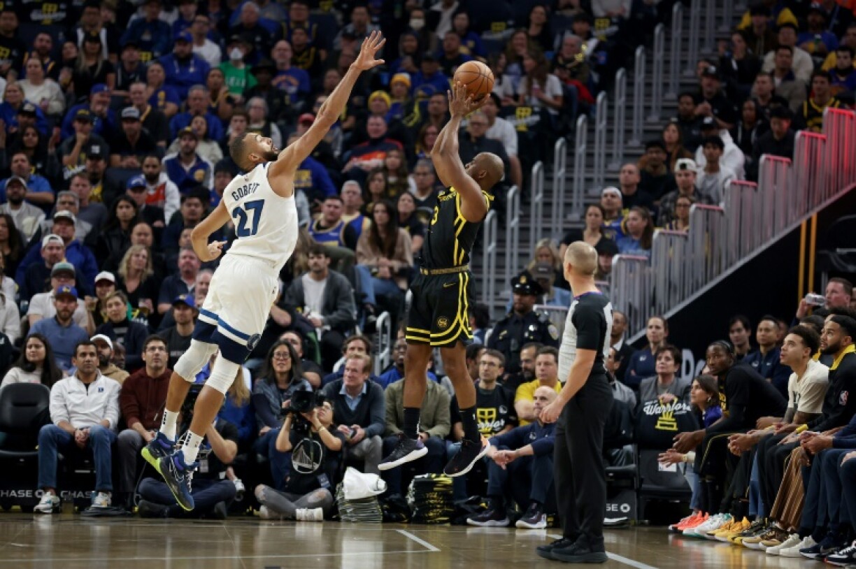 Minnesota's Rudy Gobert defends a shot by Golden State's Chris Paul in the Timberwolves' contentious NBA victory over the Warriors