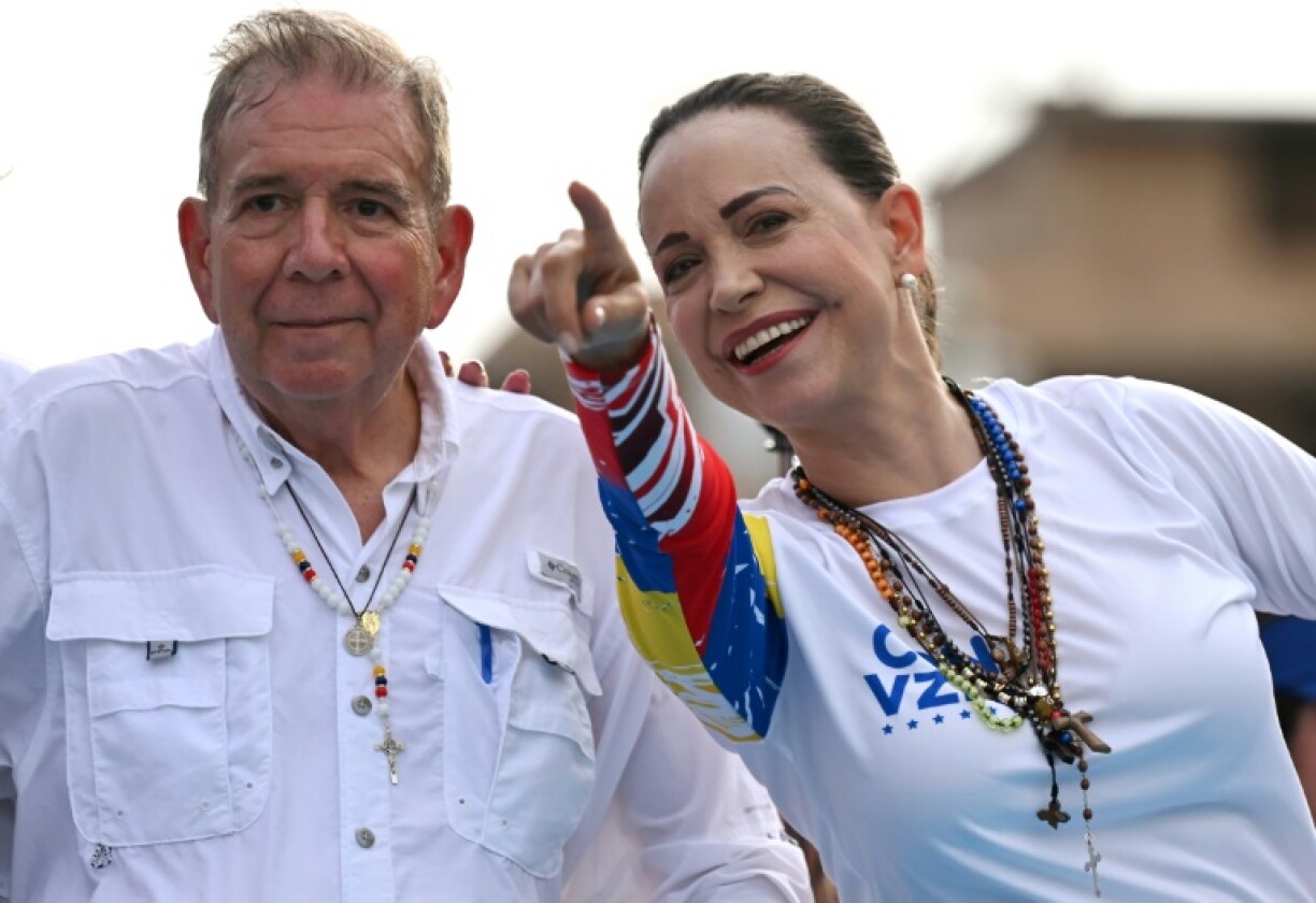 Opposition figures Edmundo Gonzalez Urrutia and Maria Corina Machado, seen here at a rally in Maracaibo in 2024, have been largely in hiding since the July 2024 election in Venezuela