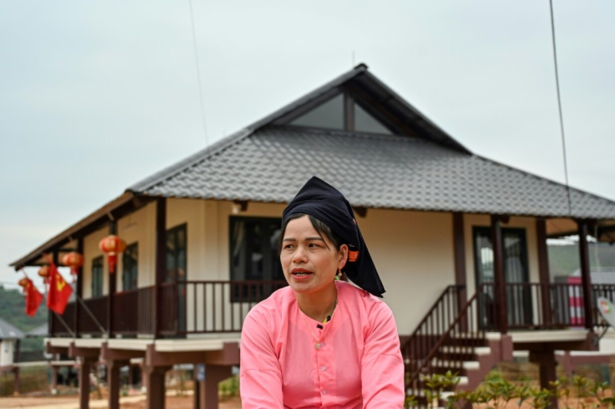 Hoang Thi Bay speaking during an interview at the new site of Lang Nu village in Lao Cai province