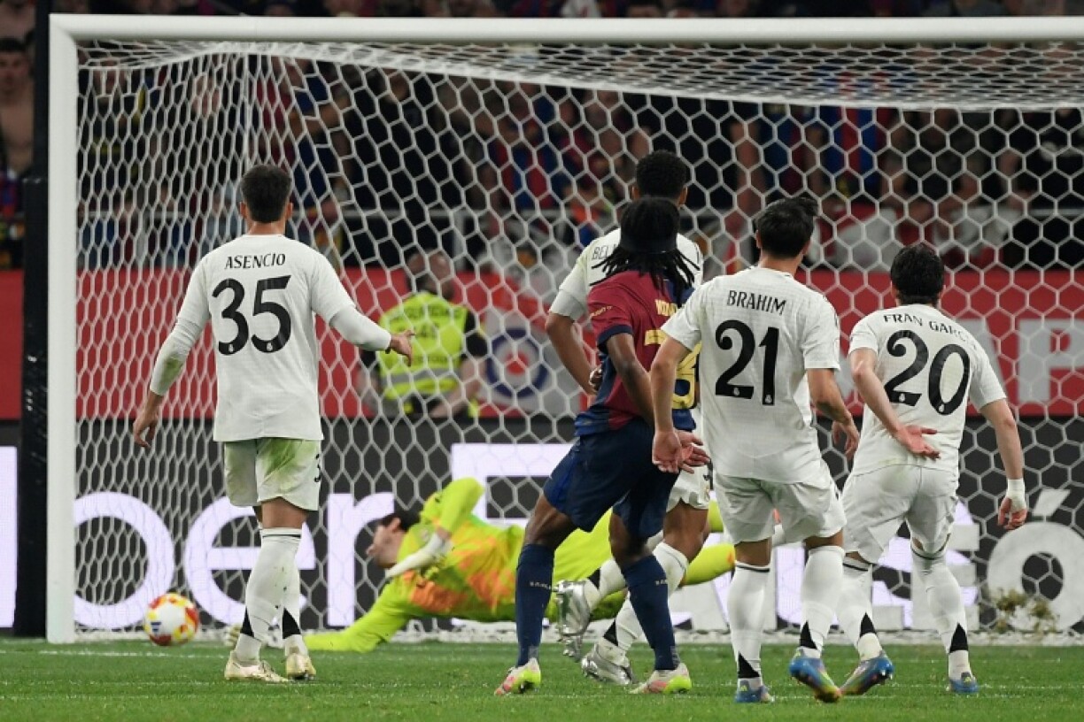 Barcelona's French defender Jules Kounde scores his team's winner against Real Madrid
