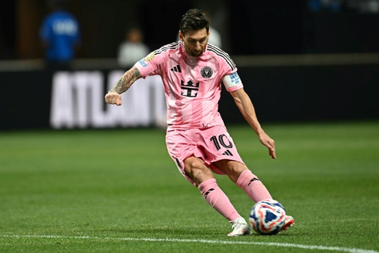Lionel Messi takes the free-kick which gave Inter Miami victory against Porto in Atlanta