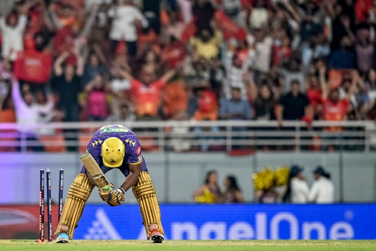 Kolkata Knight Riders' Andre Russell reacts after getting clean bowled to end his side's failed attempt to chase 112