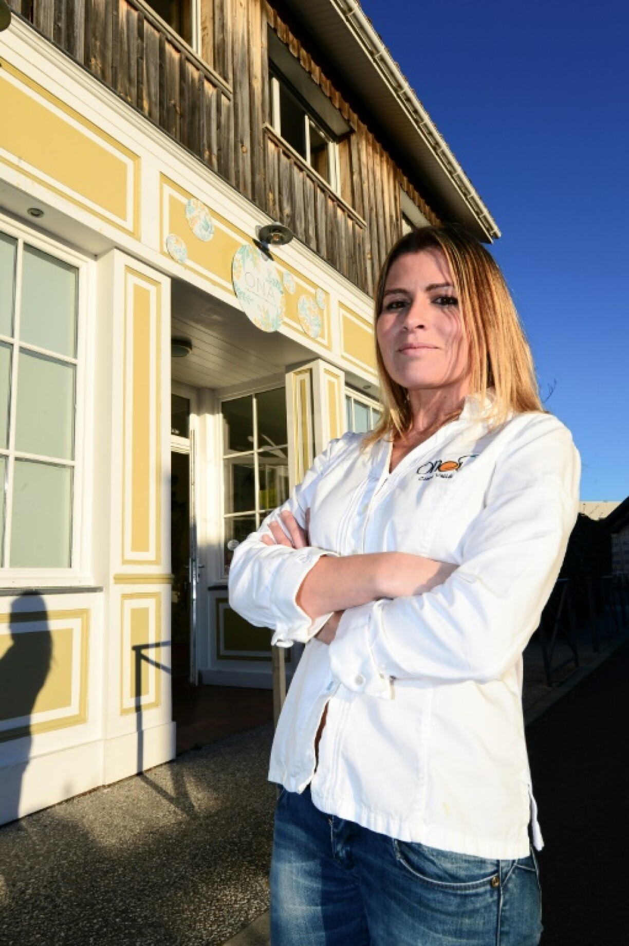French chef Claire Vallee poses in front of her now closed vegan restaurant in Ares in 2021