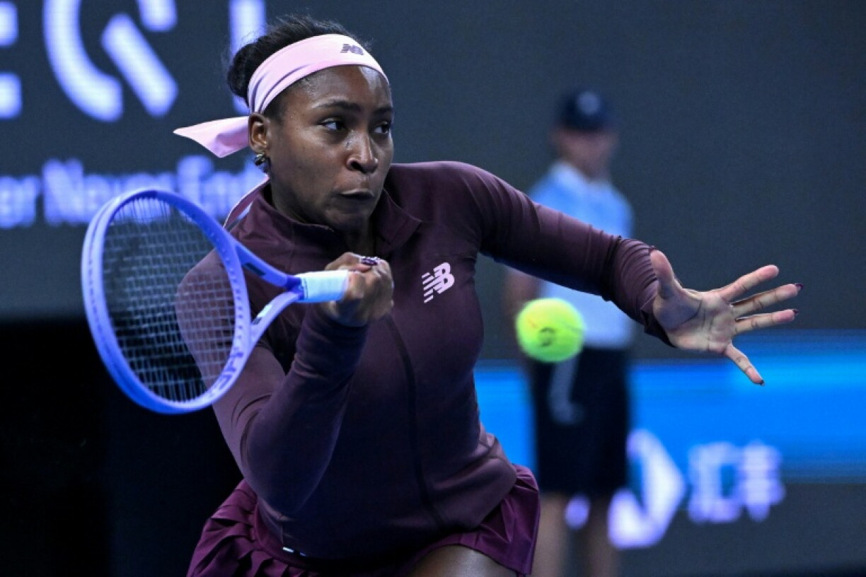 US player Coco Gauff hits a return to China's Sun Xinran during their singles match at the China Open in Beijing