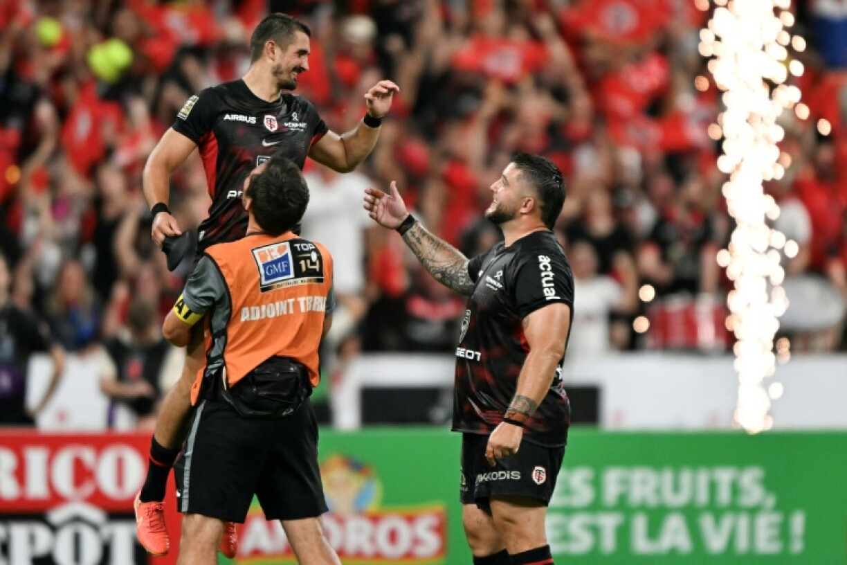 Thomas Ramos (top) celebrates at full-time of the Top 14 final