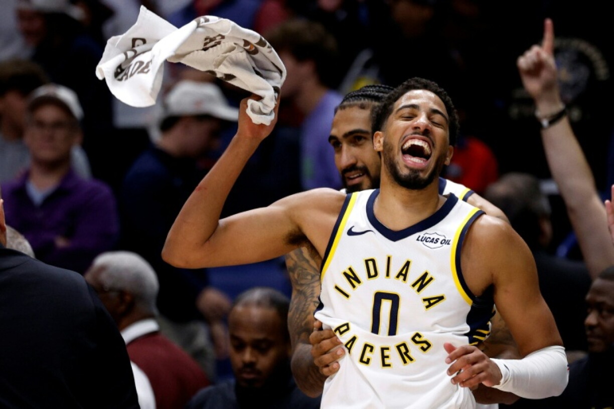 Indiana's Tyrese Haliburton and Obi Toppin celebrate the Pacers' NBA win over the New Orleans Pelicans