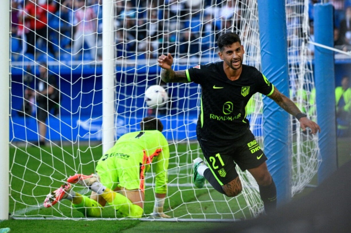 Cristian Romero headed home at the back post to claim Atletico a late victory at Alaves in La Liga on Saturday