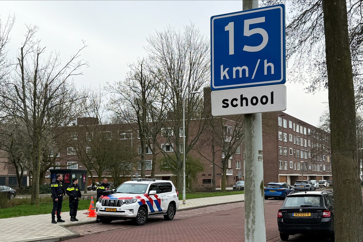 A photograph taken on 14 March 2026 shows a police car parked outside Jewish school in Amsterdam, where an explosion was reported overnight.