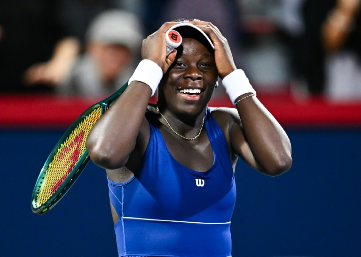 Canadian Victoria Mboko celebrates her victory over Czech Marie Bouzkova in the third round of the WTA Canadian Open in Montreal