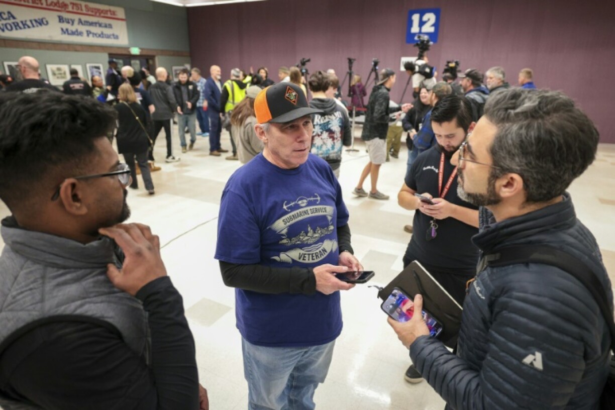 Boeing workers shown just after union leaders announced November 4 that the contract was ratified, ending a more than 50-day strike