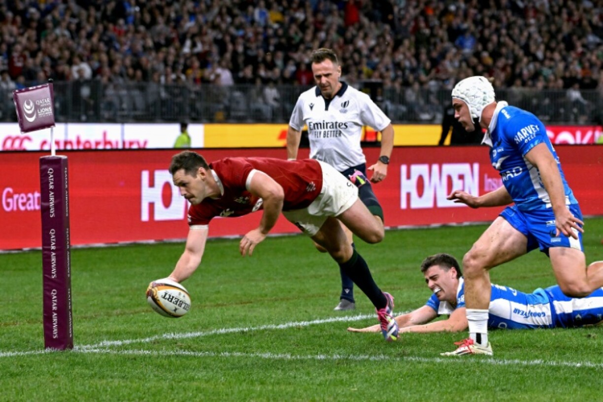 British and Irish Lions' scrum-half Tomos Williams (L) has been ruled out of their Australia tour with a hamstring injury