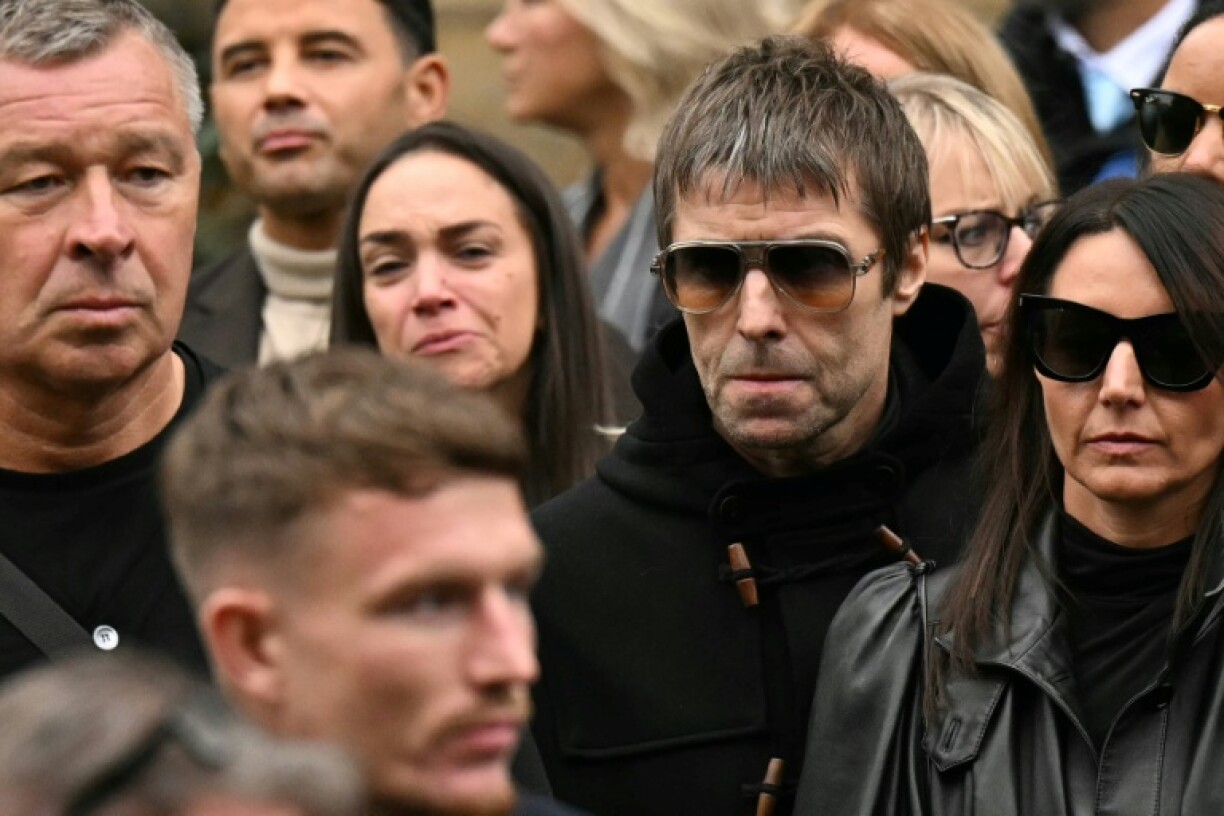 Oasis frontman Liam Gallagher (second right) pictured at Manchester Cathedral for the funeral of late British boxer Ricky Hatton