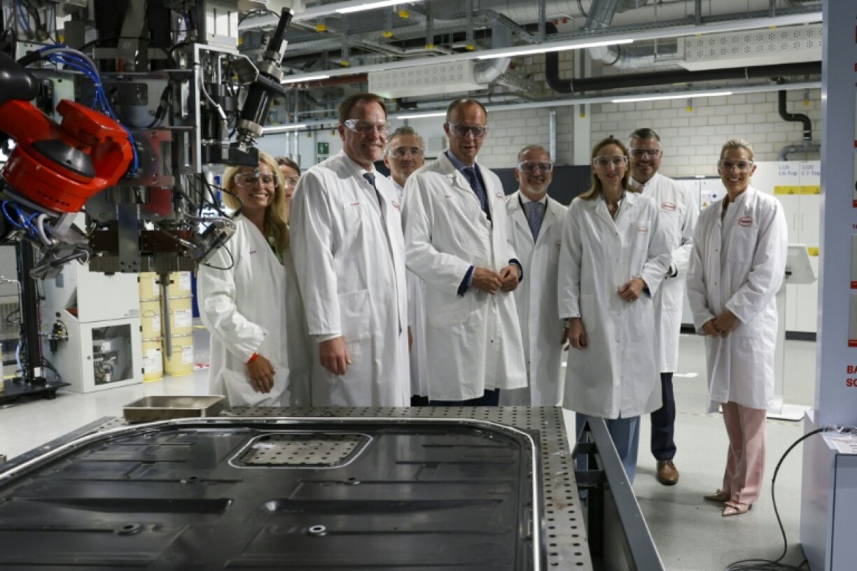 Friedrich Merz (C) has vowed to boost Europe's biggest economy with a debt-fuelled public spending bonanza