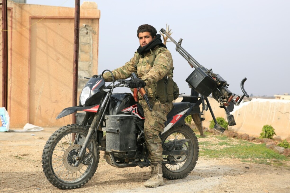 An anti-government fighter in Al-Rastan, between the Syrian rebel-held city of Hama, and Homs