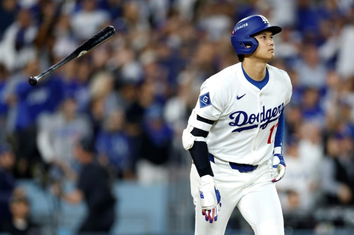 Los Angeles Dodgers star Shohei Ohtani reacts after blasting the second of two home runs in a playoff victory over the Cincinnati Reds