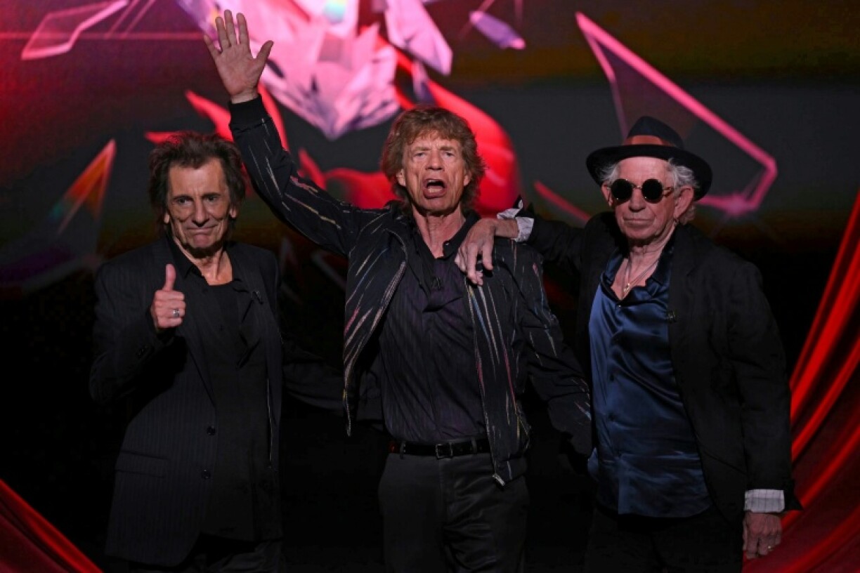 (g-d) Ron Wood, Mick Jagger et Keith Richards, du groupe de rock britannique The Rolling Stones, lors du lancement de leur nouvel album "Hackney Diamond" à Londres, le 6 septembre 2023