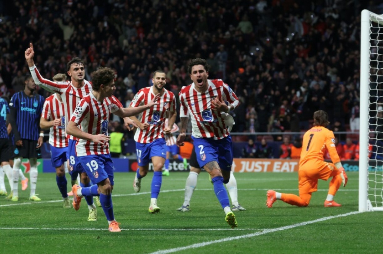 Atletico Madrid defender Jose Gimenez celebrates after scoring their second goal against Inter Milan on Wednesday