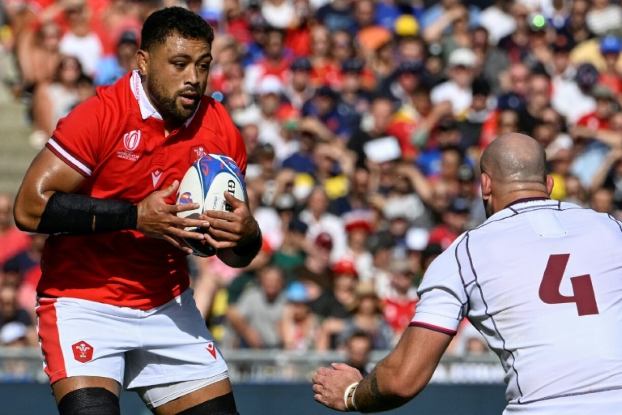 Wales number eight Taulupe Faletau (left) is back after injury