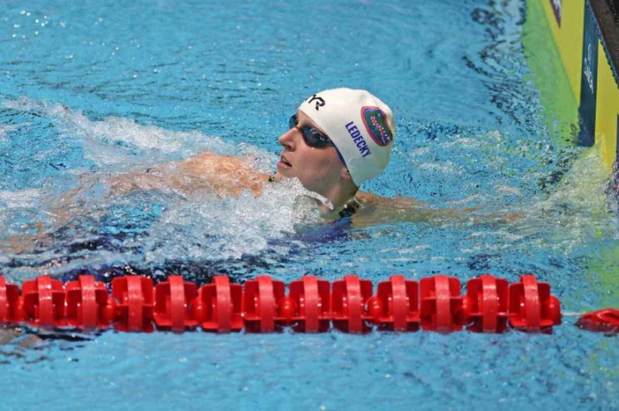 Katie Ledecky checks the scoreboard after winning the 1,500m freestyle at the US Swimming Championships in Indianapolis