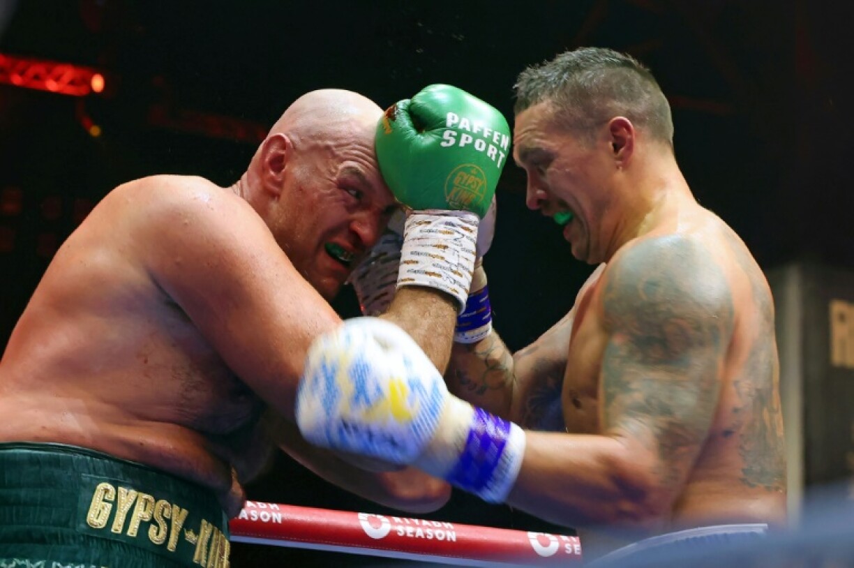 Tyson Fury (L) and Oleksandr Usyk will fight in Riyadh on Saturday