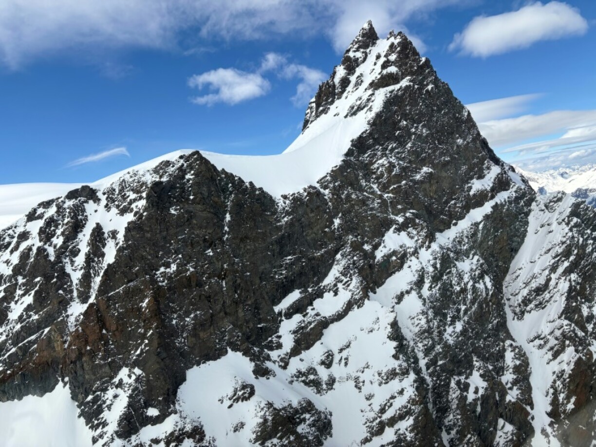 The Rimpfischhorn is a 4,199-metre (13,776-foot) mountain east of Zermatt, near the Italian border