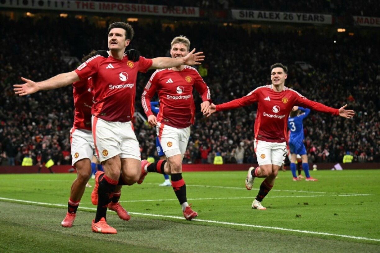 Manchester United defender Harry Maguire (left) celebrates his winning goal against Leicester