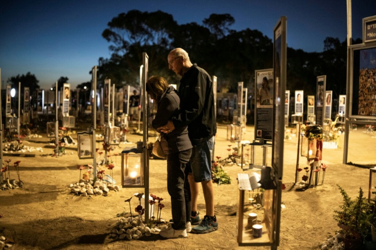 Mourners gather at the site of the Nova music festival in Re'im, southern Israel to mark the third anniversary of Hamas's October 7, 2023 attack