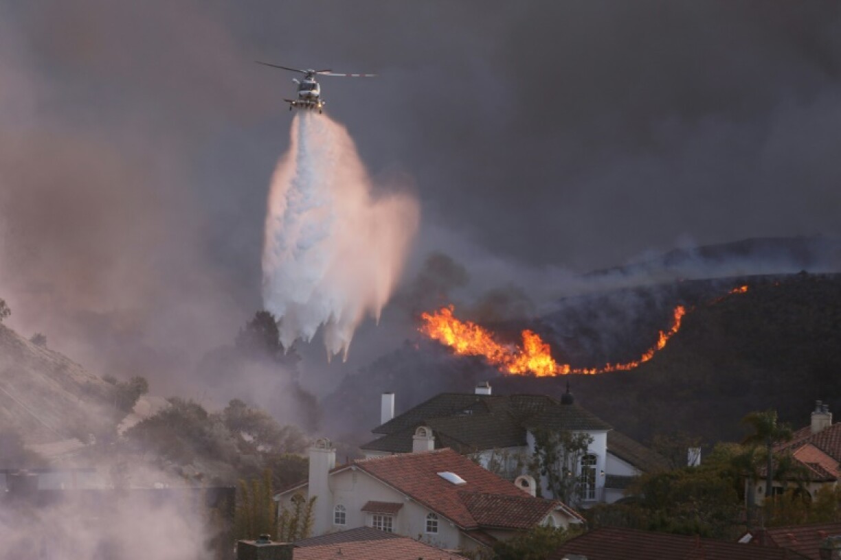 Television viewers were transfixed as helicopter pilots loaded water into their aircraft then dumped it with pinpoint accruacy on flames
