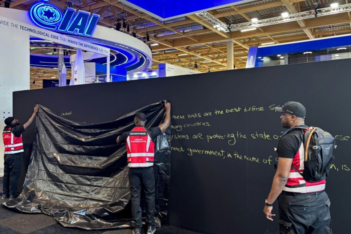 An Israeli exhibitor wrote a message in yellow chalk on one of the walls, saying the hidden defence systems 'are protecting the state of Israel these days'