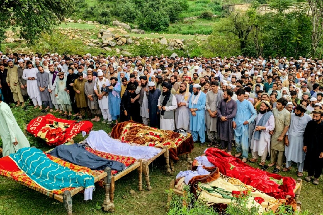 Mourners offer funeral prayers for flood victims in Pakistan's Bajaur district