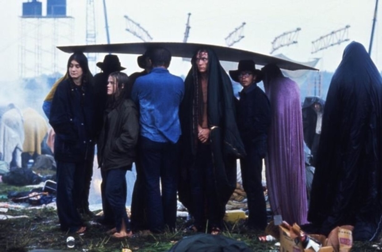 Ill-equipped visitors waiting for the rain to stop.