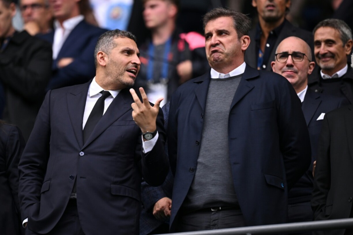 Manchester City chairman Khaldoon al-Mubarak (L) with the club's chief executive Ferran Soriano