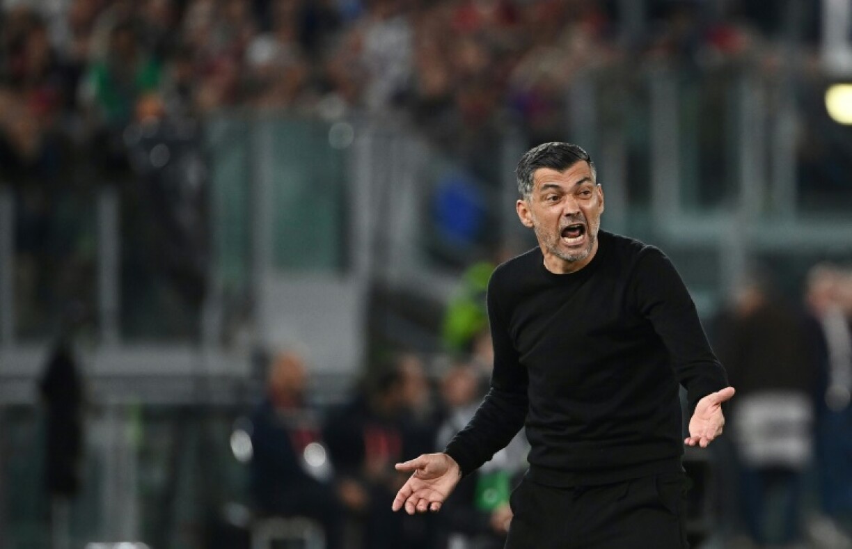 Sergio Conceicao urges on his AC Milan team as they lost the Italian Cup final to Bologna
