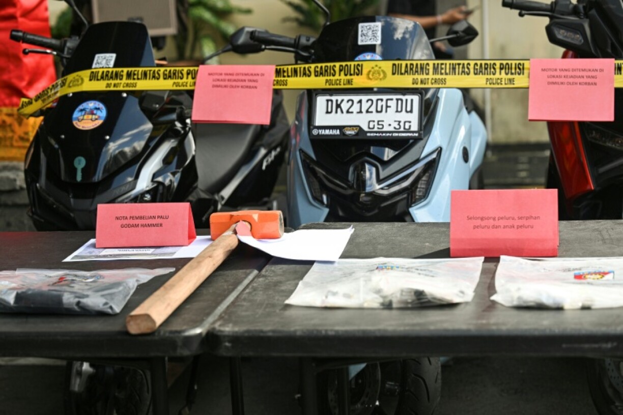Evidence seized from the suspects allegedly involved in the murder of an Australian man at a Bali villa