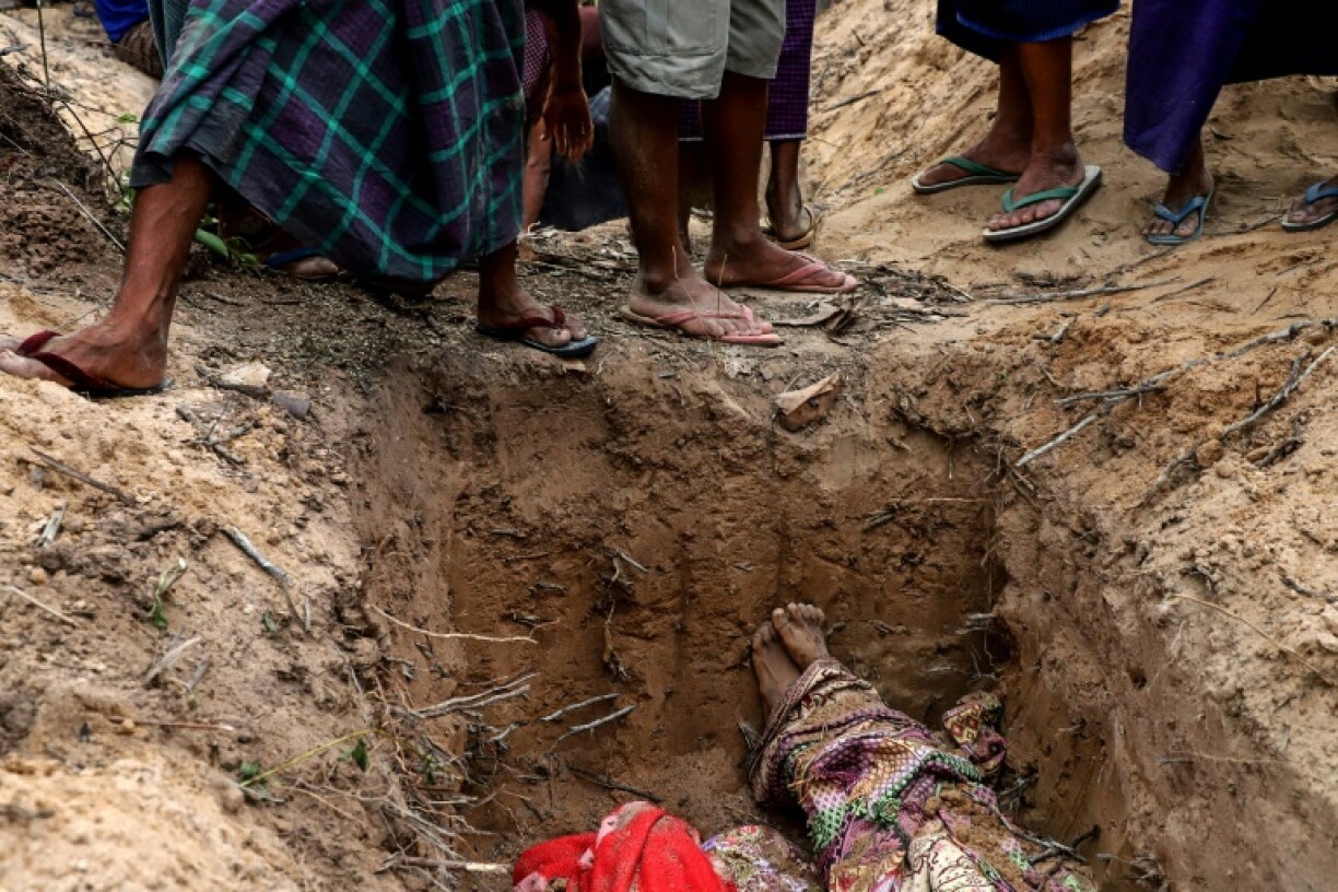 The community buried the victims on the same day as the air strike, scooping earth out of the hard-packed ground