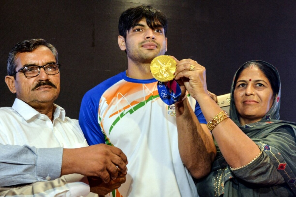 India has brought back just 10 Olympic gold medals, among them javelin star Neeraj Chopra (C)