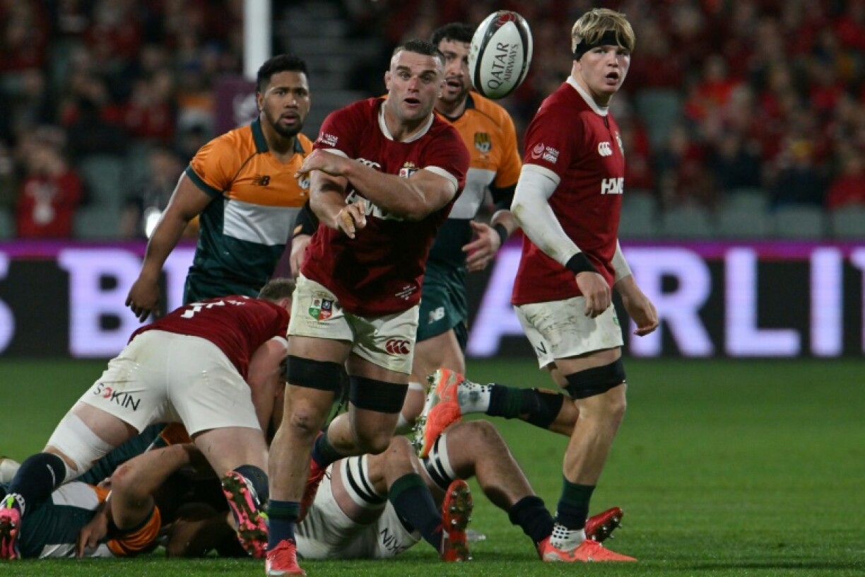 England back-row forward Ben Earl passes the ball while playing for the British and Irish Lions against an Australia and New Zealand Invitational XV in Adelaide