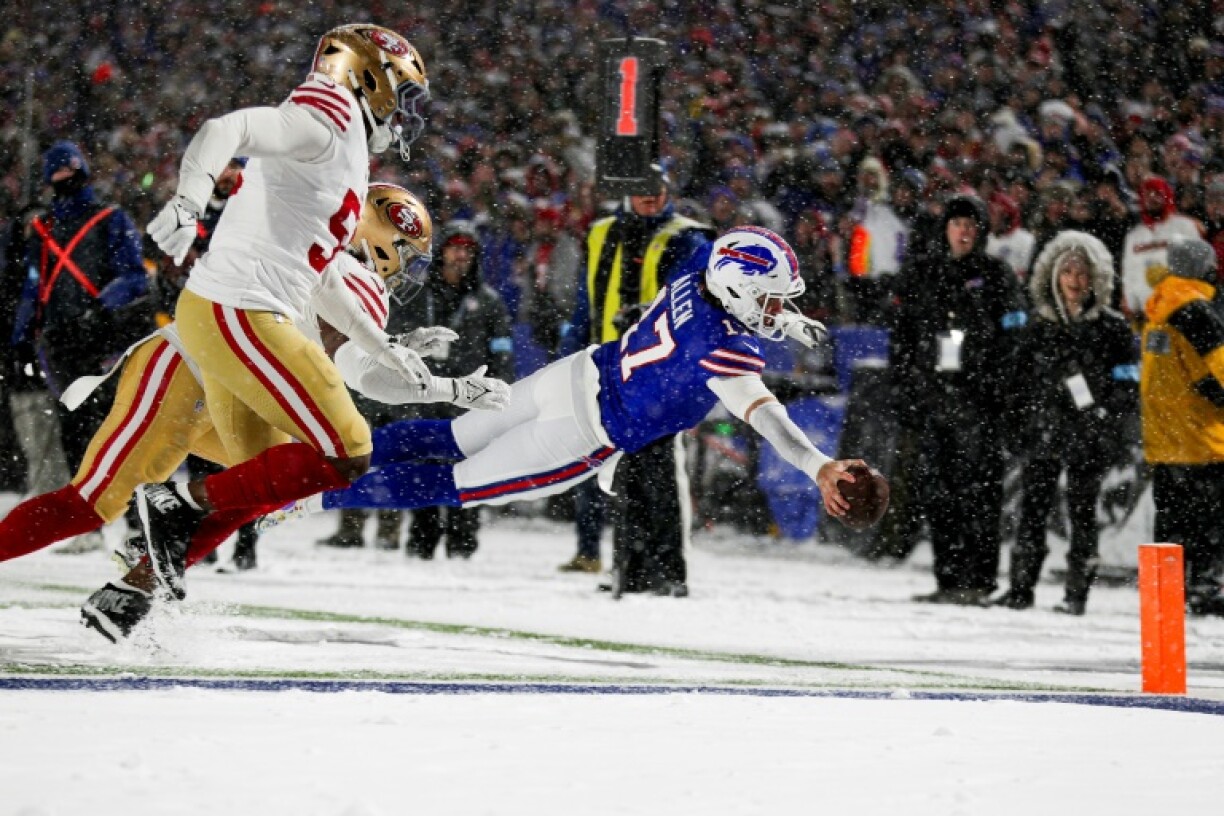 Josh Allen of the Buffalo Bills dives for a unique touchdown in the third quarter against the San Francisco 49ers on Sunday.