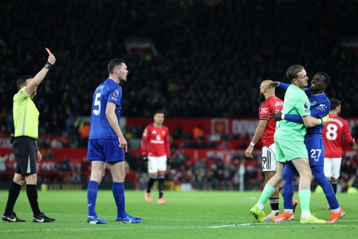 Everton's Idrissa Gueye (second right) is sent off at Old Trafford following an altercation with teammate Michael Keane