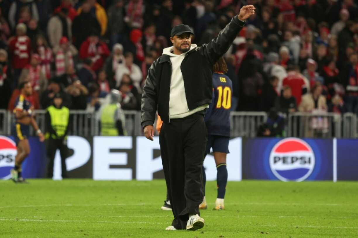Vincent Kompany waves to fans after Bayern Munich drew with Arsenal in the Champions League on Wednesday