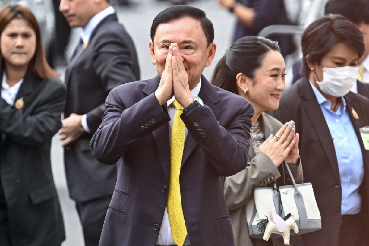 Thailand's former prime minister Thaksin Shinawatra arrives at the Supreme Court in Bangkok