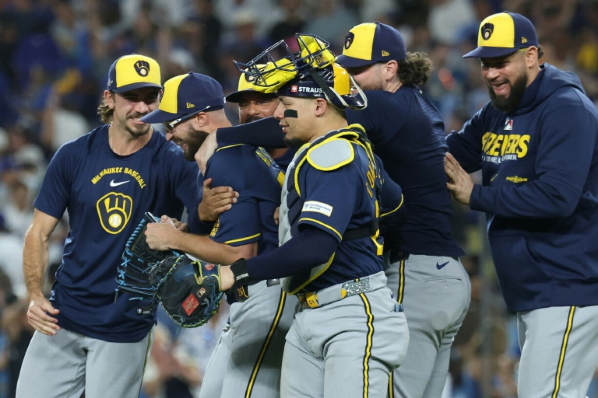 The Milwaukee Brewers celebrate reaching their first World Series since 1982, in which they will face the Tampa Bay Rays with each seeking a first MLB crown